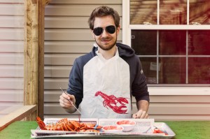eating lobster with a lobster bib alma new brunswick canada